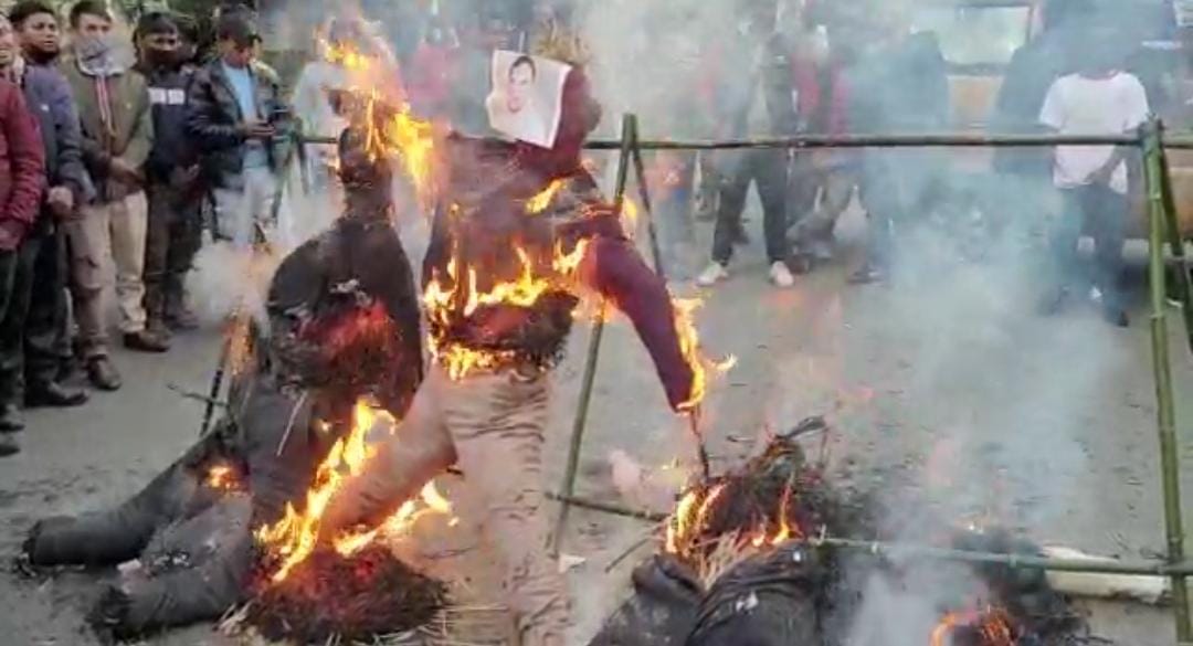 Pressure groups burnt effigies of Amit Shah, Conrad K Sangma, Himanta Biswa Sarma